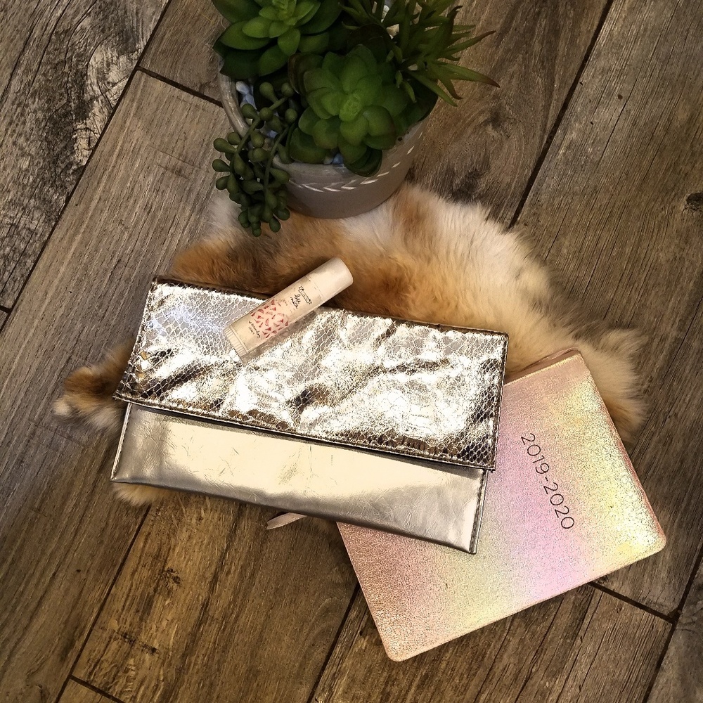 Saks Fifth Avenue black label silver clutch